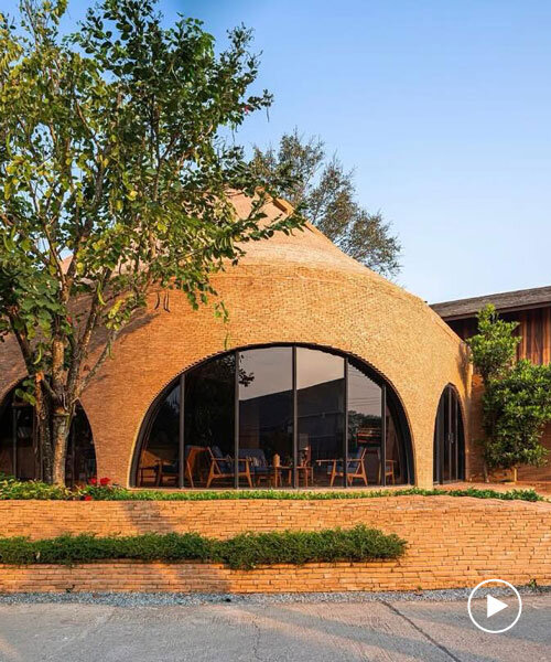 undulating brick facade wraps studio miti's athita pool villa and spa in thailand