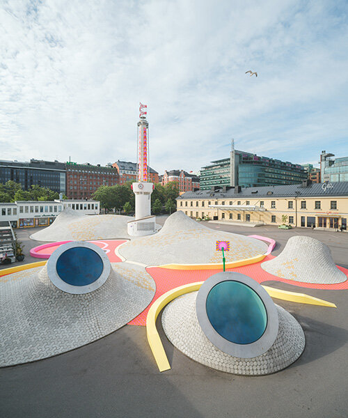 transparent happiness: yinka ilori transforms iconic mounds of helsinki's amos rex